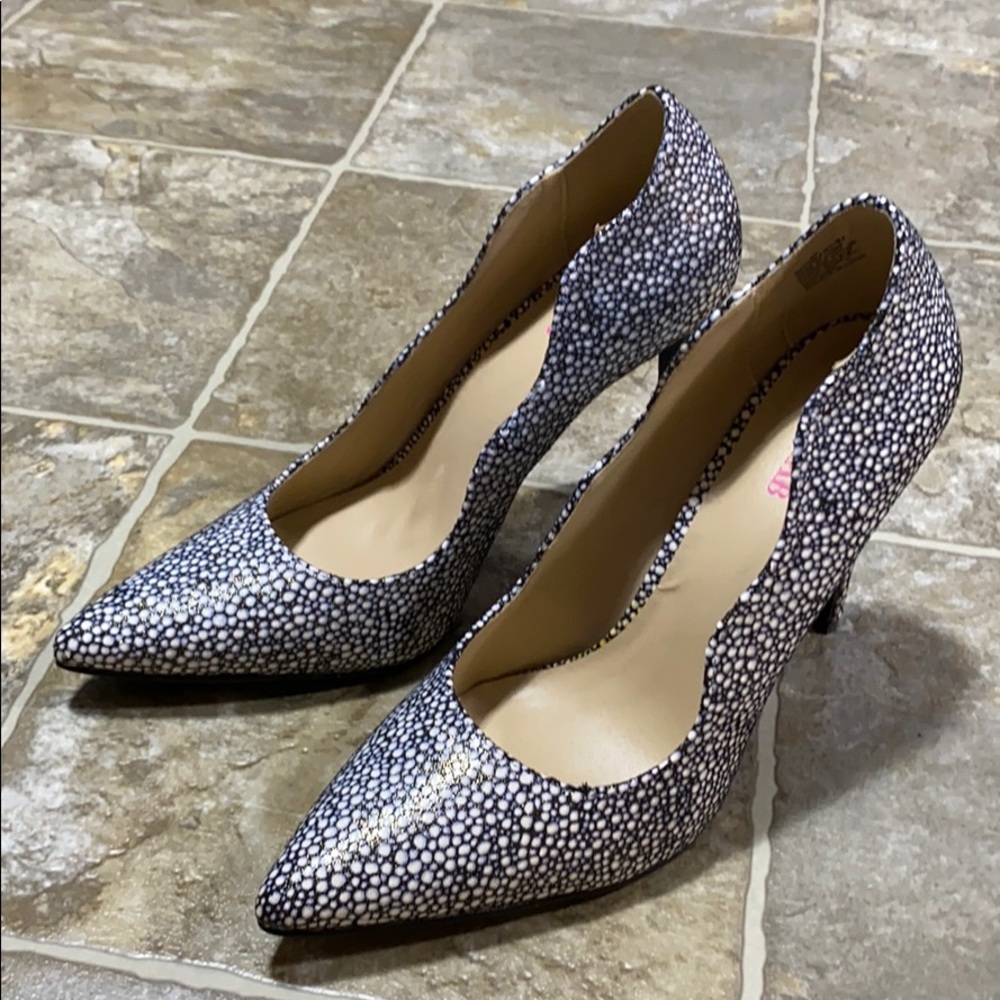 Black and white spotted heels